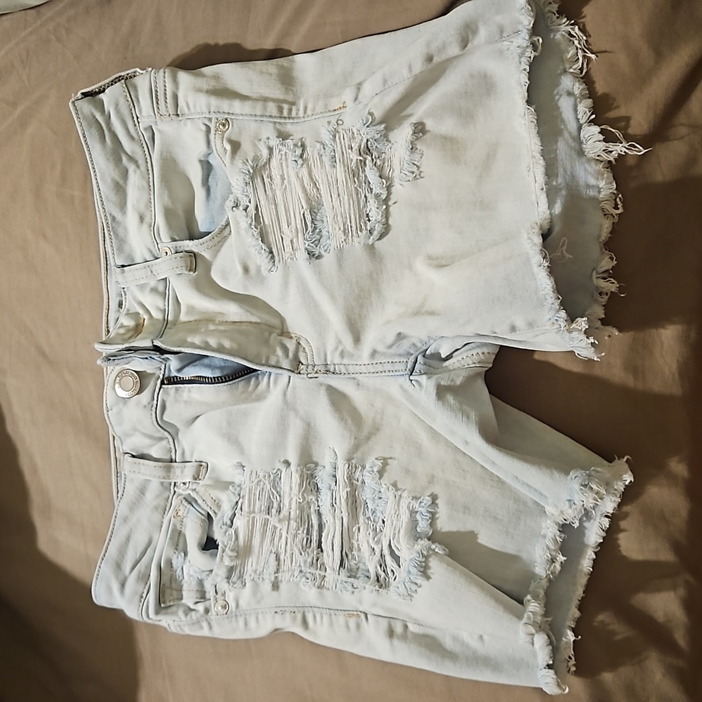 American Eagle Next Level Stretch Womans Sz 10 Distressed Lightwash Denim Shorts